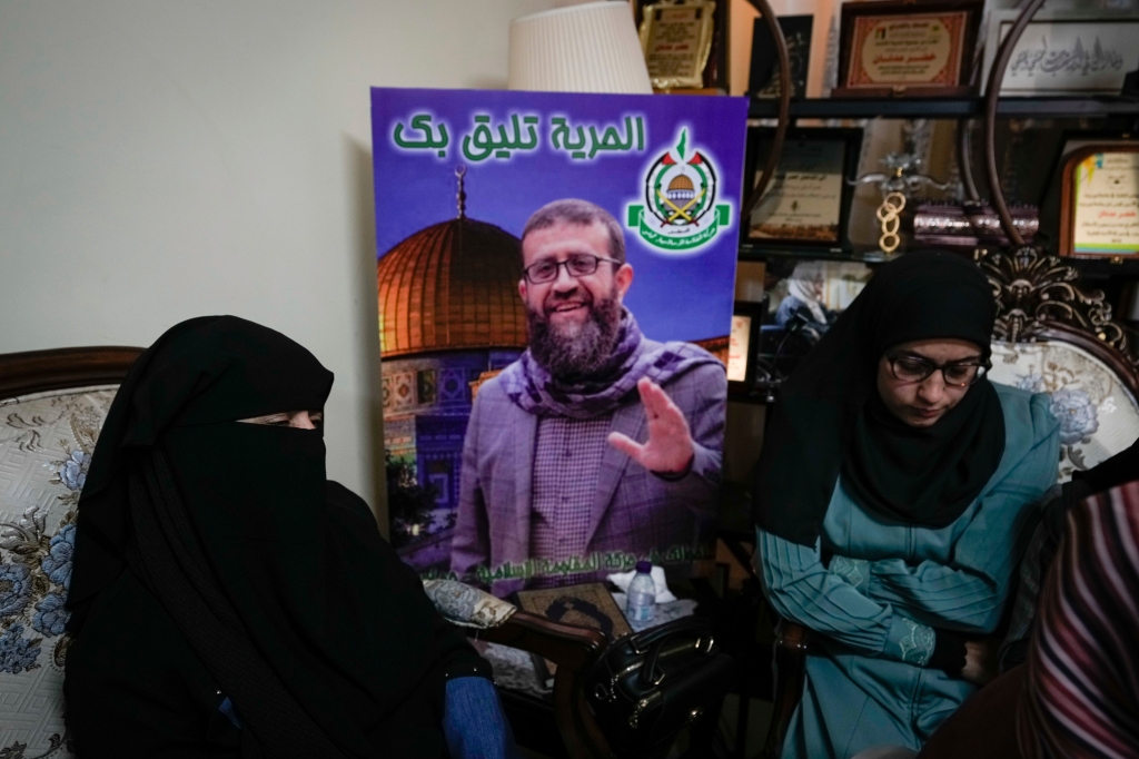 Relatives of Khader Adnan mourn at his family home in the West Bank village of Arrabe, on May 2, 2023.