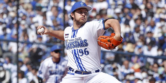 Trevor Bauer pitches for the Yokohama DeNA Baystars