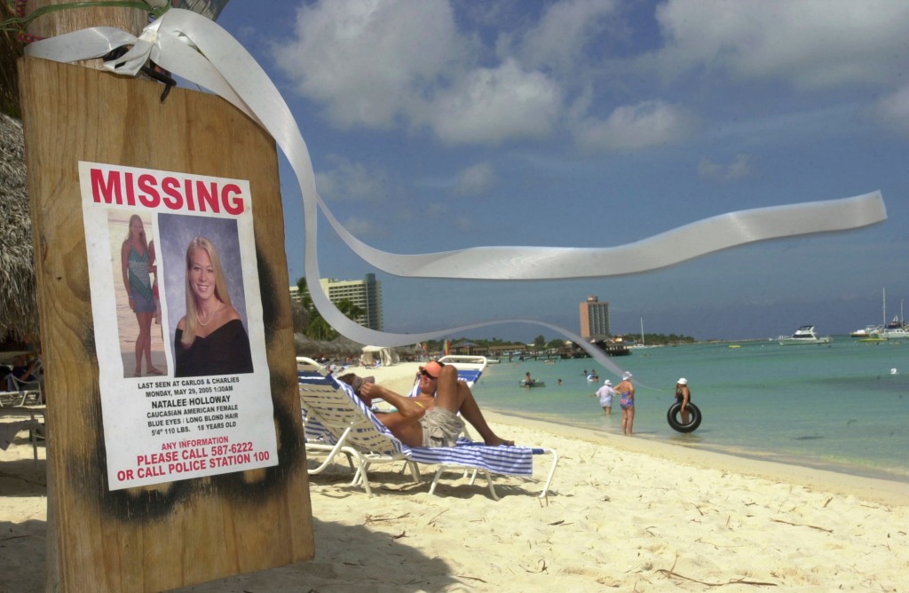 A sign of Natalee Holloway is seen on Palm Beach, in front of her hotel in Aruba on June 10, 2005.