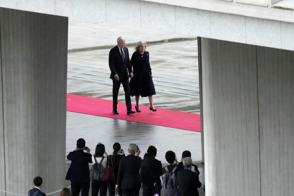 President Joe Biden and first lady Jill Biden walk into the Peace Memorial Park for the G7 Leaders' Summit in Hiroshima, Japan, on May 19, 2023.