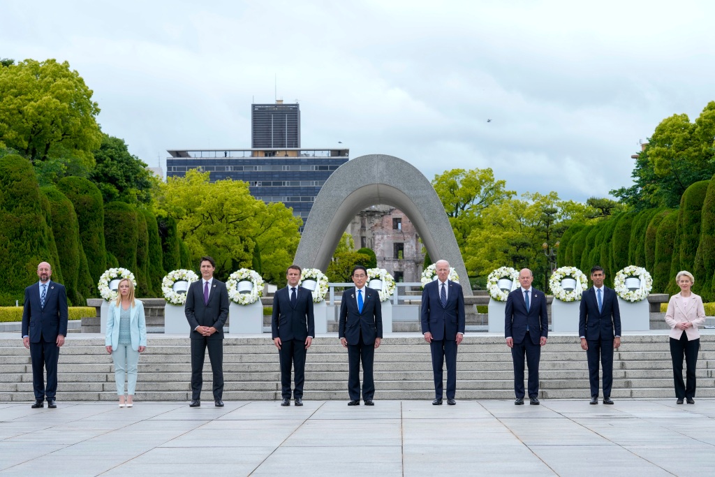 President Joe Biden, fourth right, and other G7 leaders pose for a photo during a visit to the Hiroshima Peace Memorial Park in Hiroshima, Japan, on May 19, 2023. 
