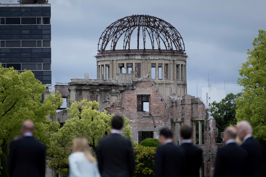 Leaders of the Group of Seven nations' meetings walk before the Atomic Bomb Dome during the G7 Leaders' Summit in Hiroshima, Japan, on May 19, 2023.