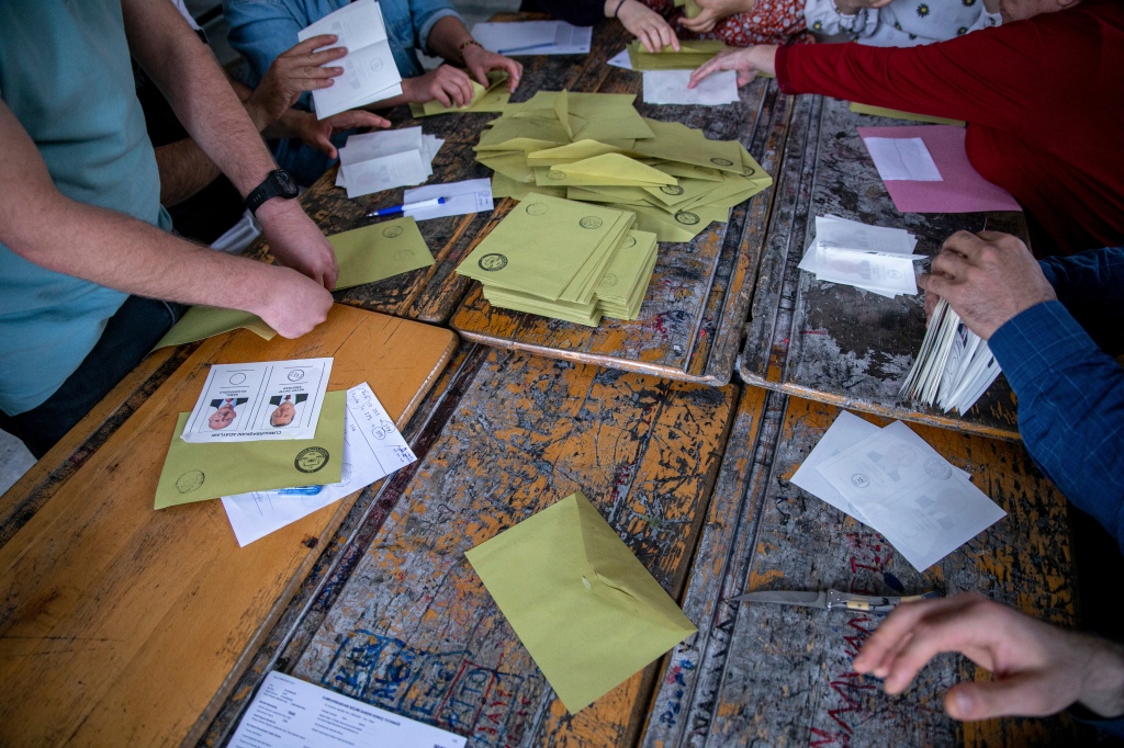 Polling station officials count after voting ended in Diyarbakir on Sunday.