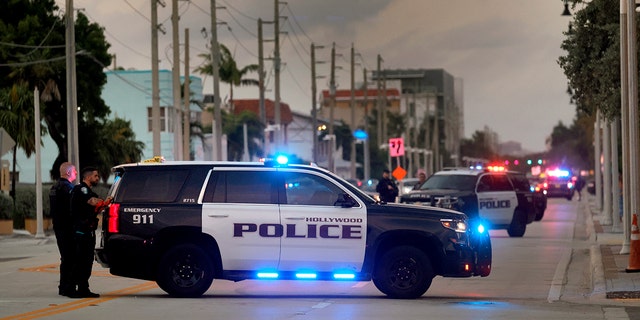 A police car at an intersection