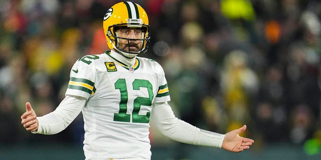 Aaron Rodgers looks for a call