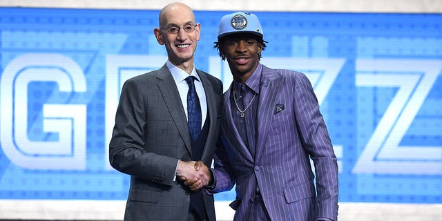 Adam Silver and Ja Morant pose during NBA Draft