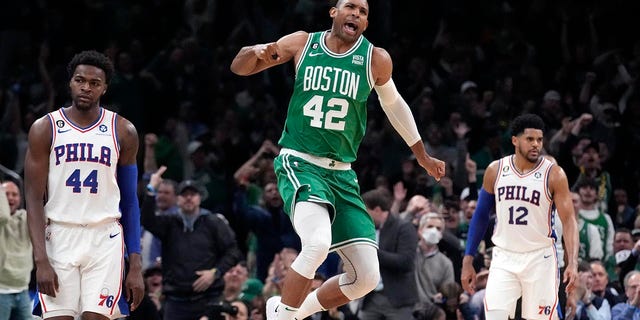 Al Horford celebrates