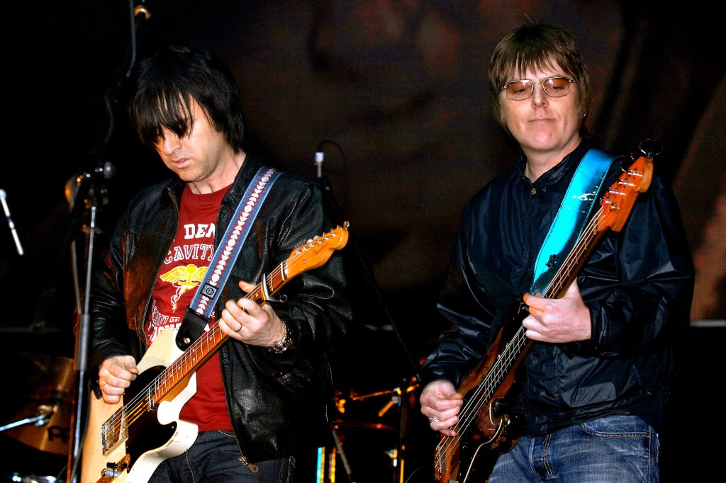 Rourke (right) and Johnny Marr, on stage during the 'Manchester Versus Cancer' charity concert, held at the Manchester Evening News (M.E.N.) Arena in Manchester, on Jan. 28 2006.