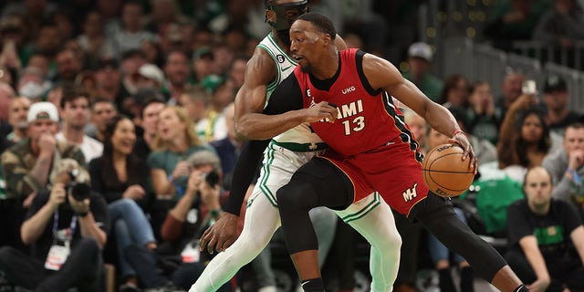 Bam Adebayo backs down Jaylen Brown