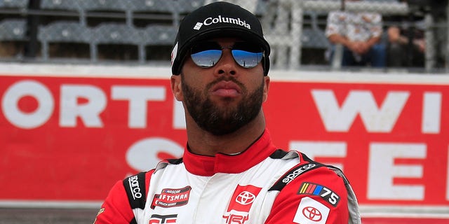 Bubba Wallace looks on