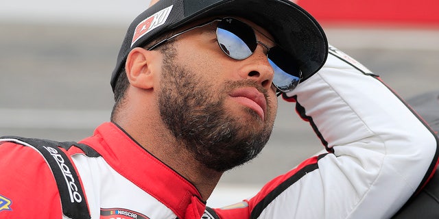 Bubba Wallace looks on