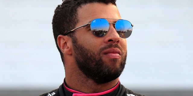 Bubba Wallace looks on