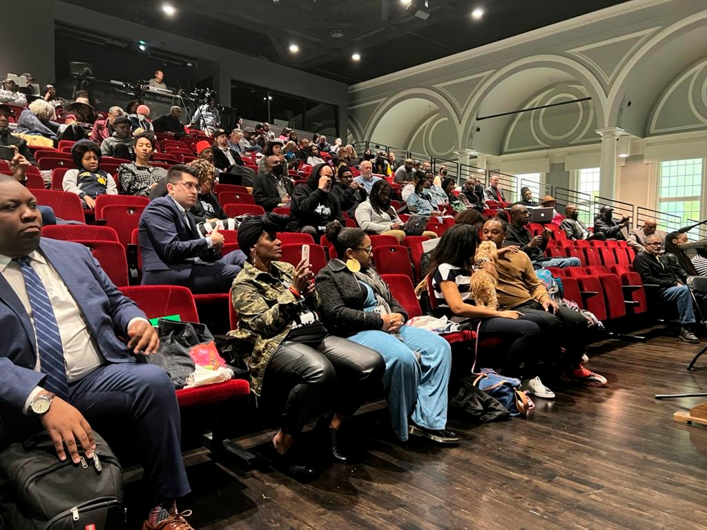 People listen to the California reparations task force, a nine-member committee studying restitution proposals for African Americans, at a meeting at Lesser Hall in Mills College at Northeastern University in Oakland, Calif., on May 6, 2023.