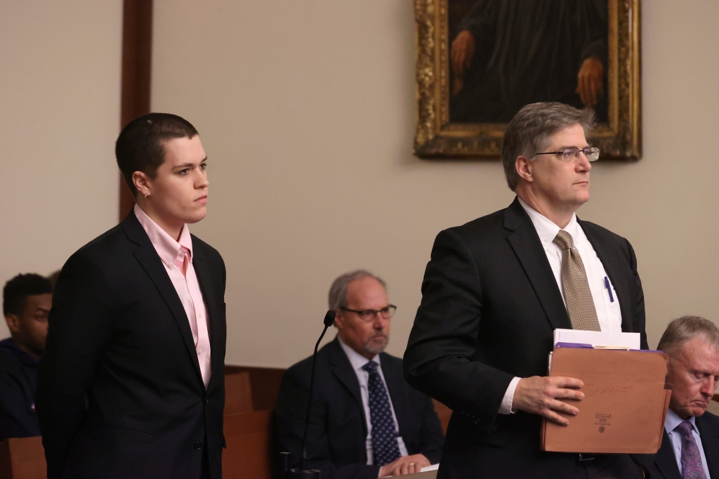 Riley Dowell stands with her attorney during arraignment at Boston Municipal Court on Jan. 23, 2023. 