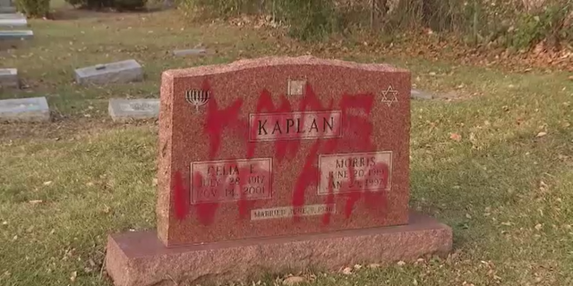 Antisemitism spray painted on headstones