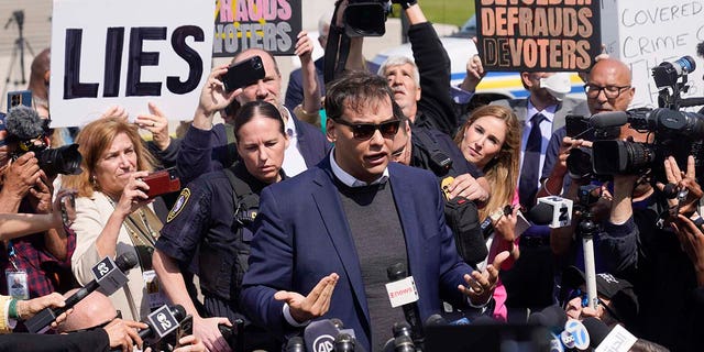 U.S. Rep. George Santos leaves the federal courthouse in Central Islip