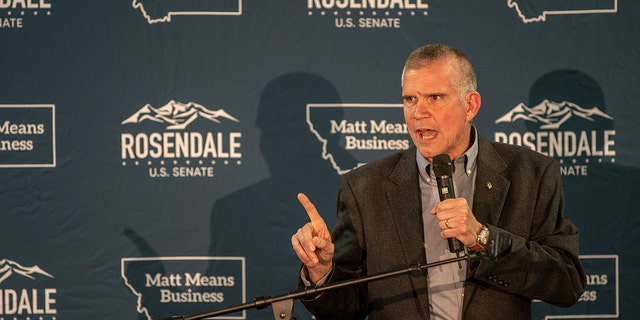 Rep. Rosendale with a microphone