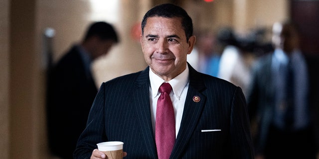 Democratic Texas Rep. Henry Cuellar walks on Capitol Hill