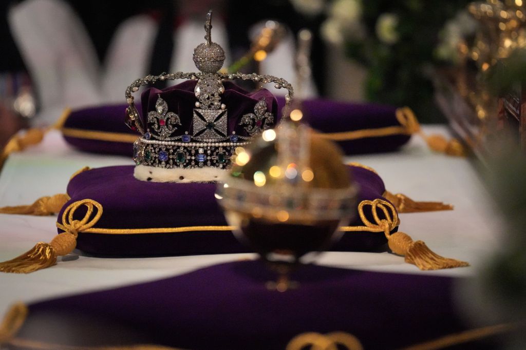 The ImperIal State Crown, orb and sceptre on the high altar, is seen during the Committal Service for Queen Elizabeth II in Windsor Castle on Sep. 19, 2022 in Windsor, England. 