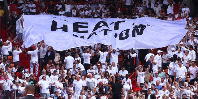 Miami Heat fans cheer during Game 4