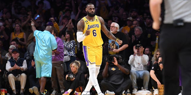 LeBron James celebrates against the Warriors