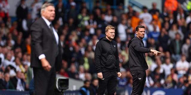 Eddie Howe stands on the sidelines during a Premier League match