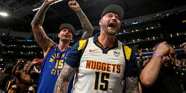 The Jokic brothers celebrate Denver's won over the Lakers