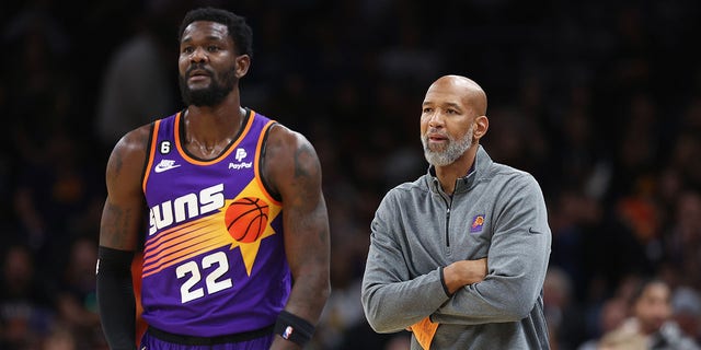 Monty Williams and Deandre Ayton during a game