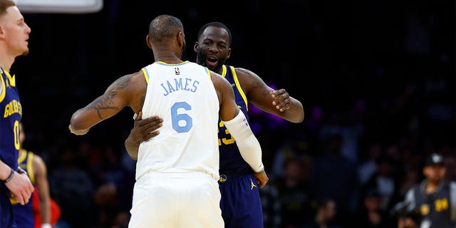 LeBron James and Draymond Green embrace