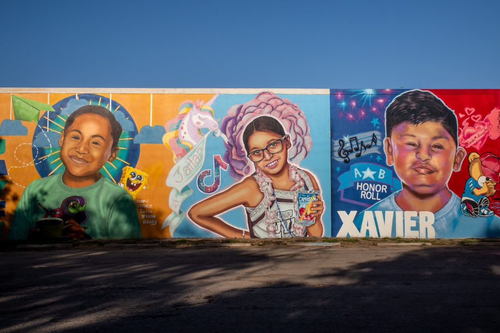 AS - APRIL 27: (L-R) Murals of 10-year-old Jayce Luevanos, 10-year-old Jailah Silguero, and 10-year-old Xavier Lopez.