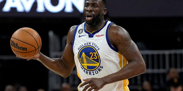 Draymond Green brings the ball up against the Lakers