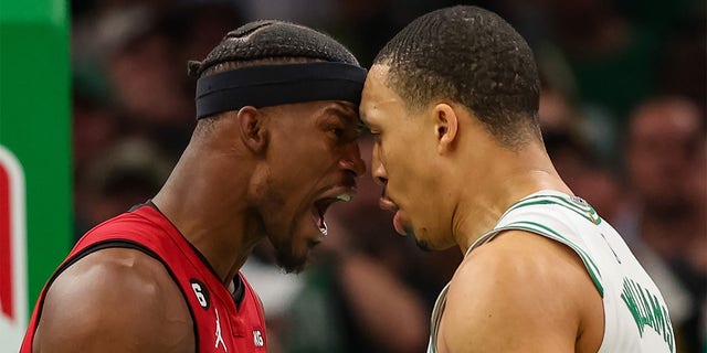 Jimmy Butler and Grant Williams exchange words