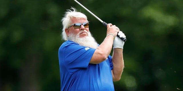 John Daly finishes swing