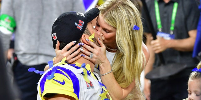 Kelly Stafford kisses Matthew