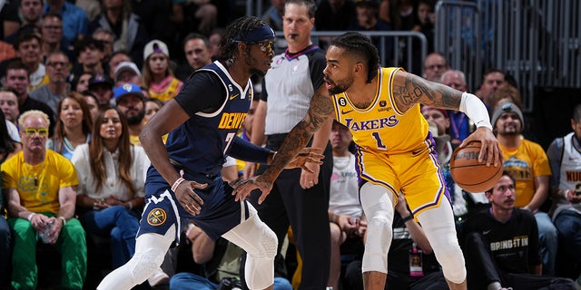 D'Angelo Russell dribbles the ball