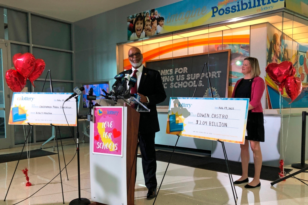 California Lottery Director Alva Johnson announces that Edwin Castro won November's record-high $2.04 billion PowerBall jackpot.