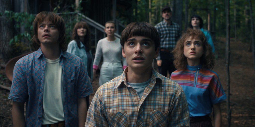 Stranger Things cast in a scene in the forest