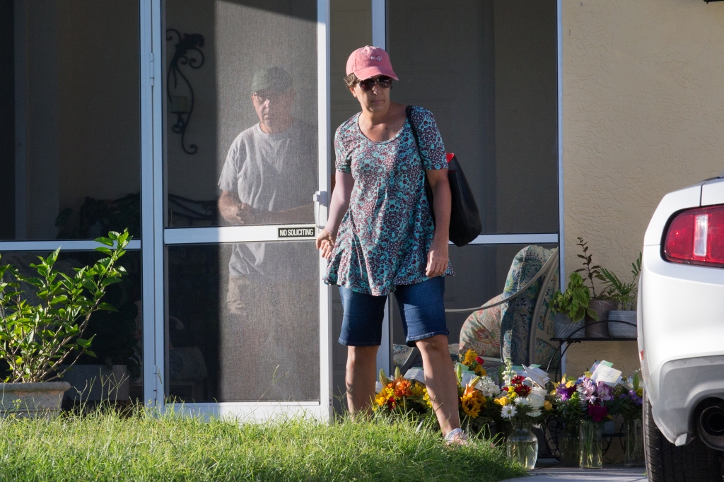 Roberta (right) and Christopher (left) Laundrie step out of her home in Florida. The "Burn After Reading" letter Roberta sent Brian was ruled admissible on Wednesday afternoon   