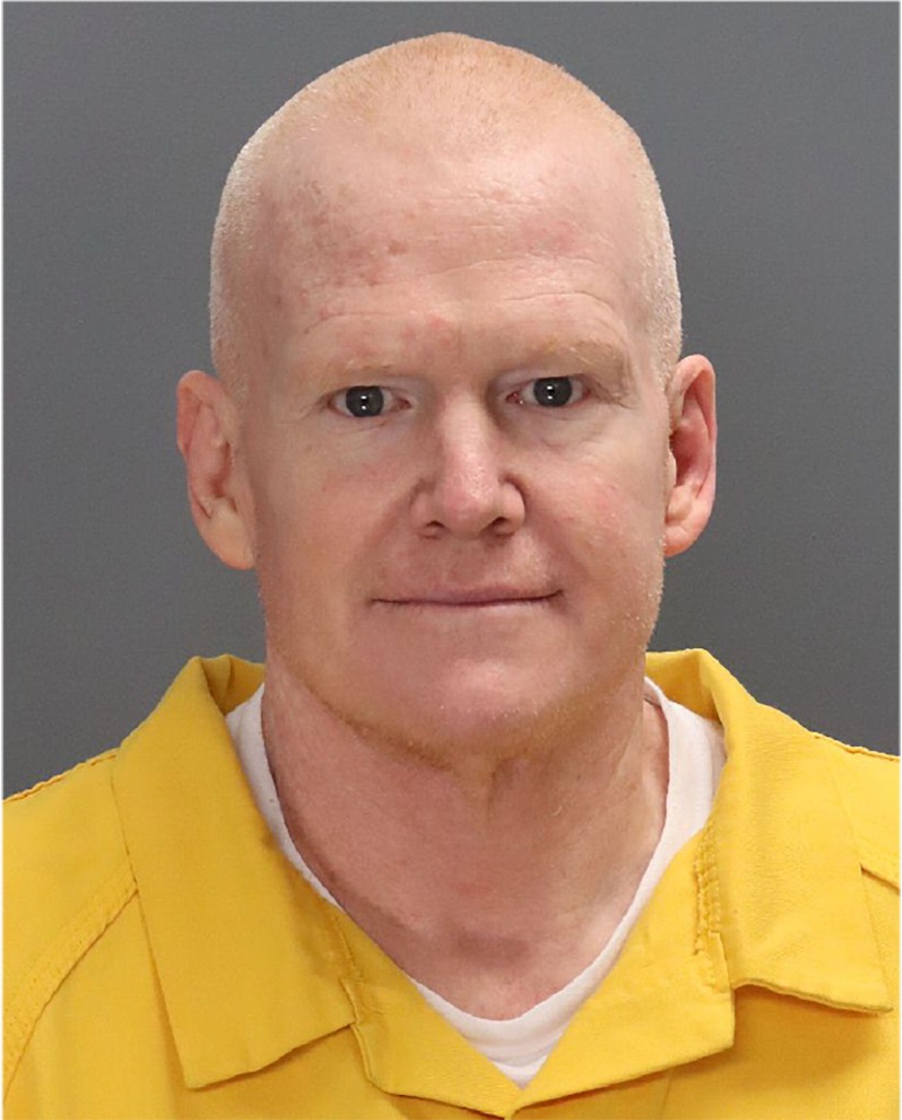 March mugshot of Alex Murdaugh in yellow prison suit with a shaved head 