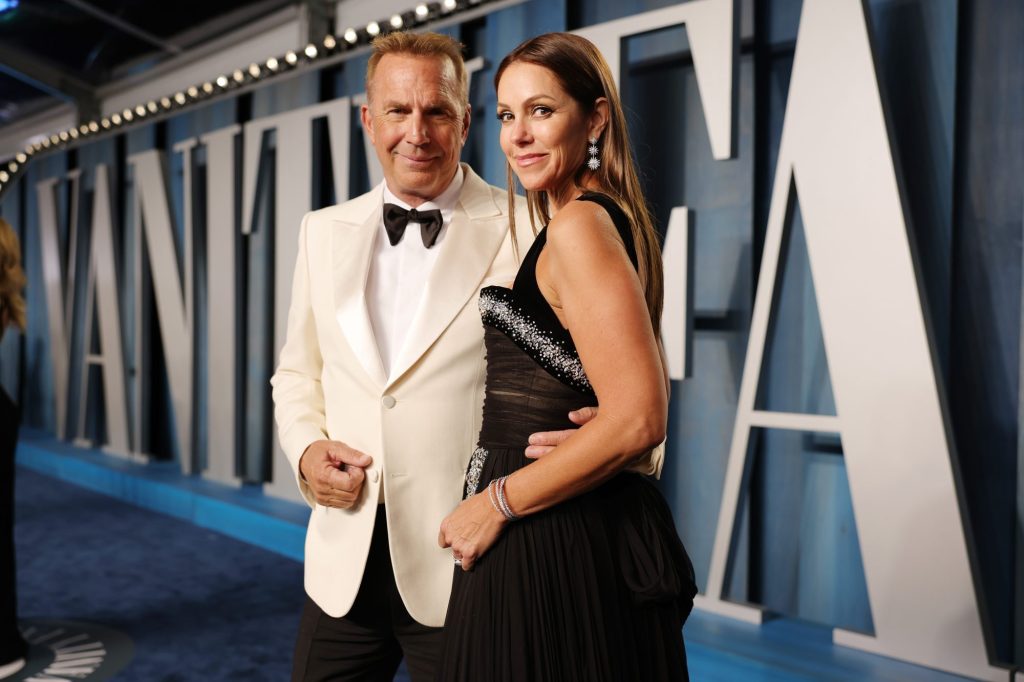 Kevin Costner and Christine Baumgartner attend the 2022 Vanity Fair Oscar Party.