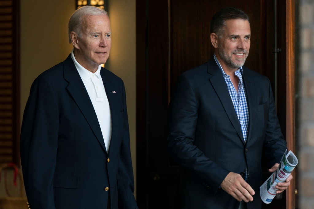 President Joe Biden stands with his son Hunter Biden 