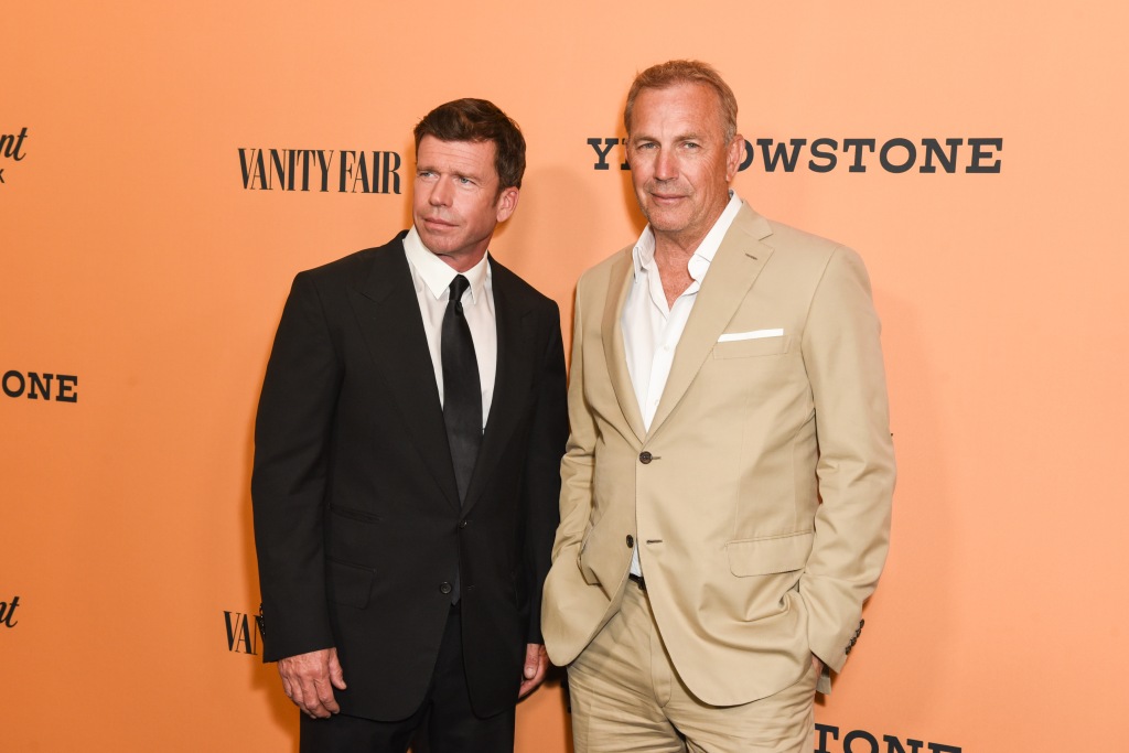 Taylor Sheridan standing next to Kevin Costner. 