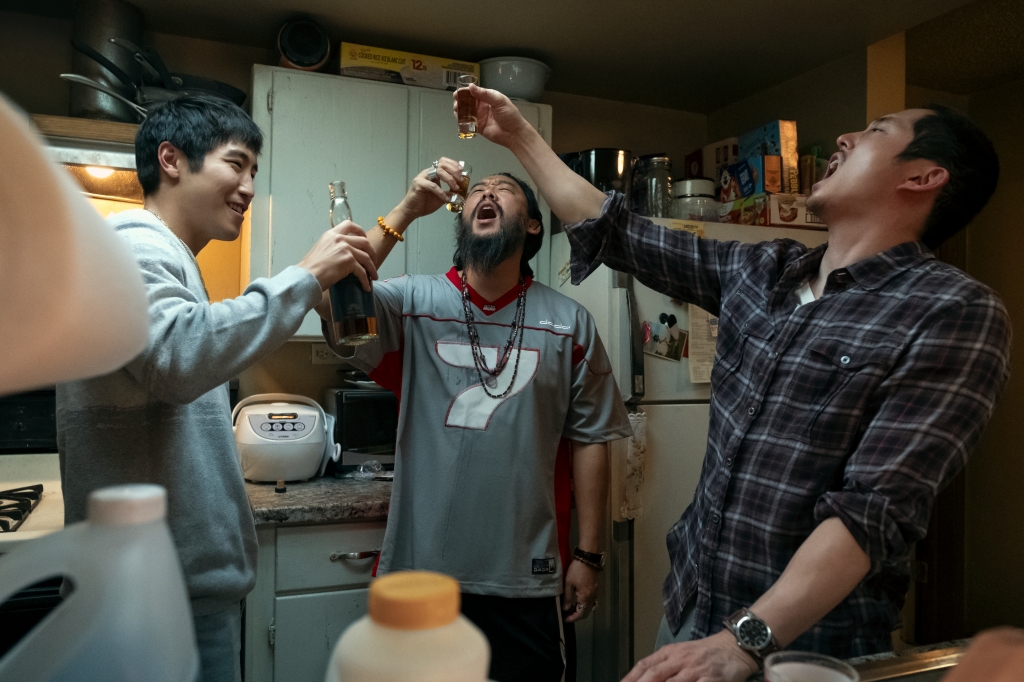 Still from "Beef" of two brothers and cousin taking shots