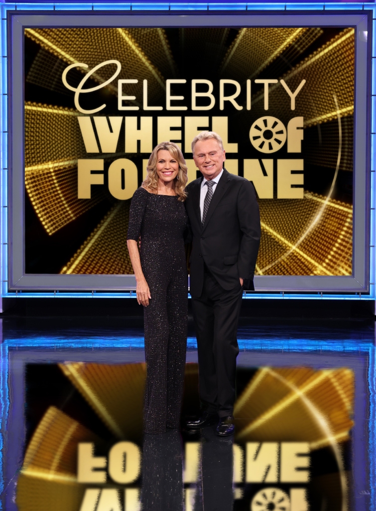 CELEBRITY WHEEL OF FORTUNE - Celebrity Wheel of Fortune stars Vanna White and Pat Sajak. VANNA WHITE, PAT SAJAK (Carol Kaelson via Getty Images)