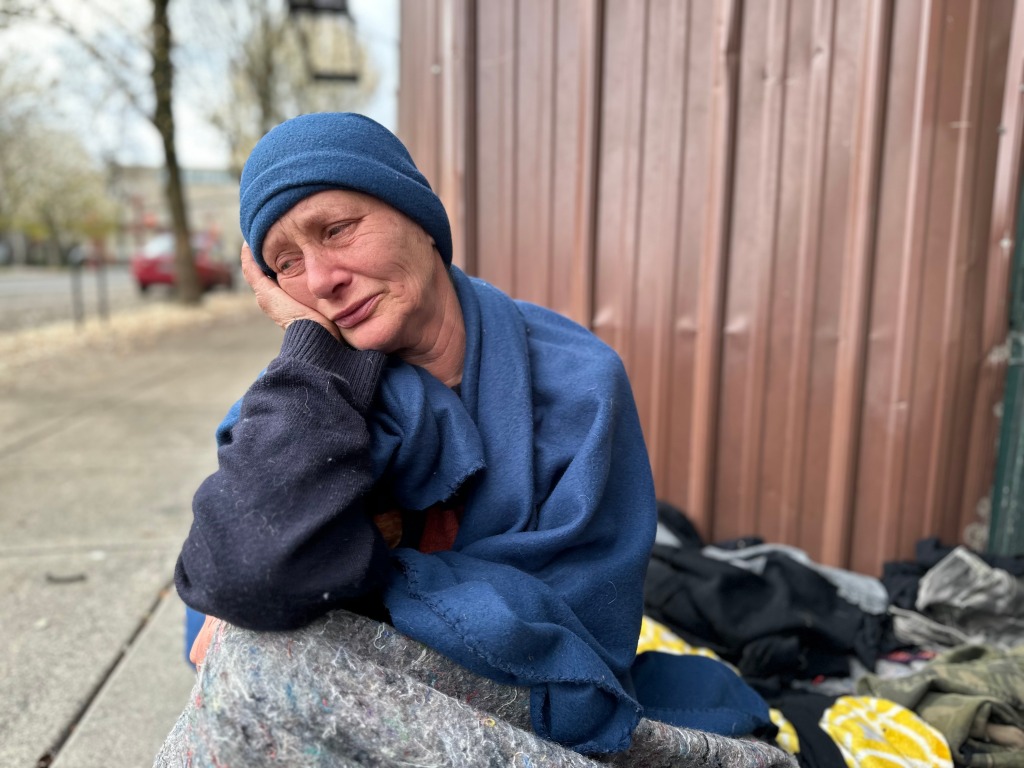 A homeless woman.