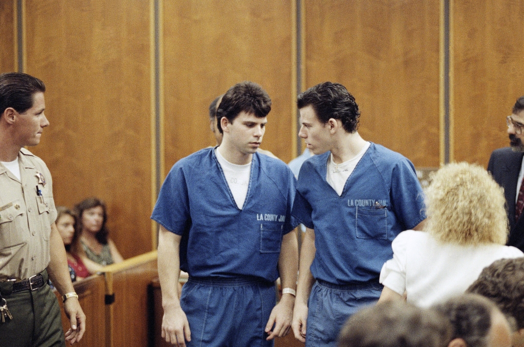 Lyle, left, and Erik Menendez, right, look at each other in court. 