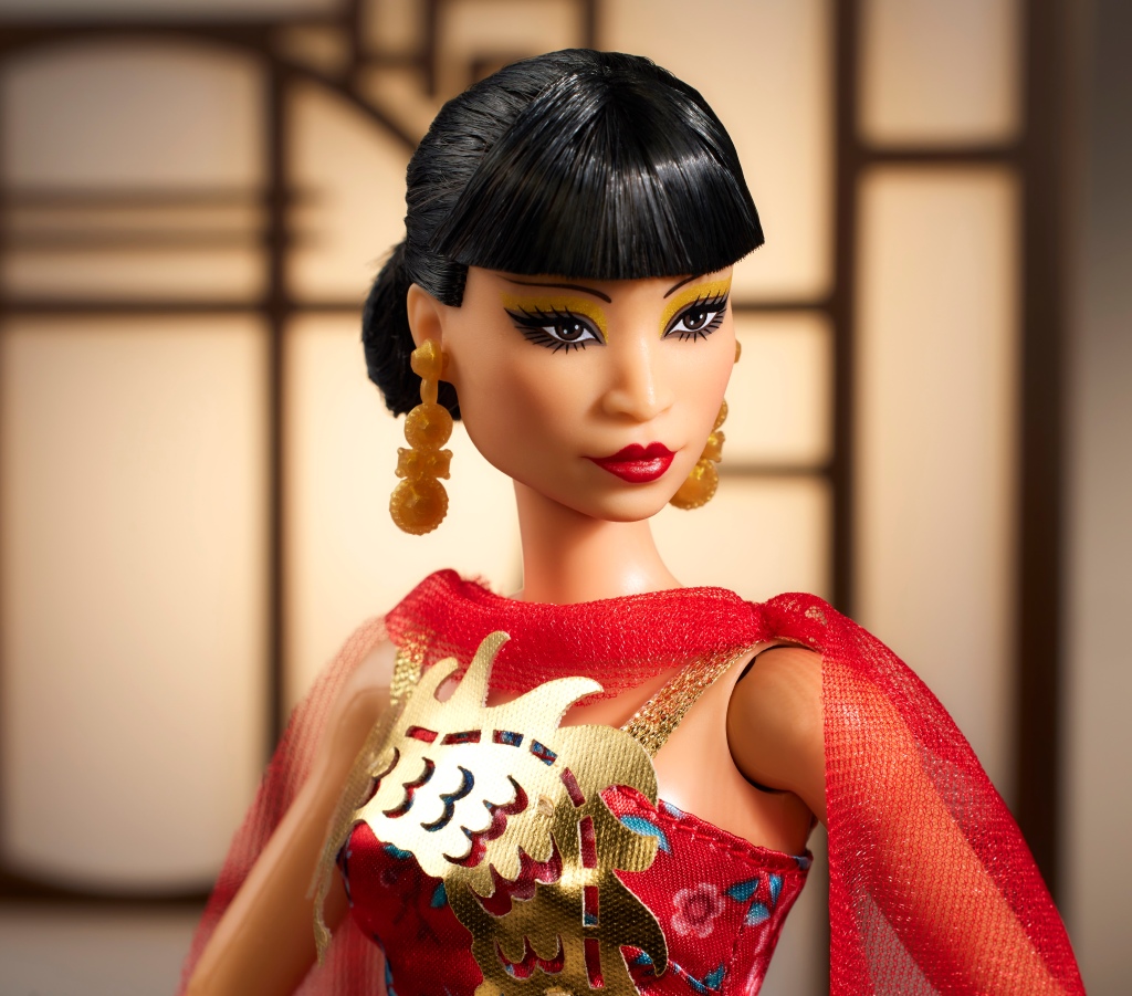 Wong's doll also features her trademark bangs, eyebrows and elaborately manicured nails.