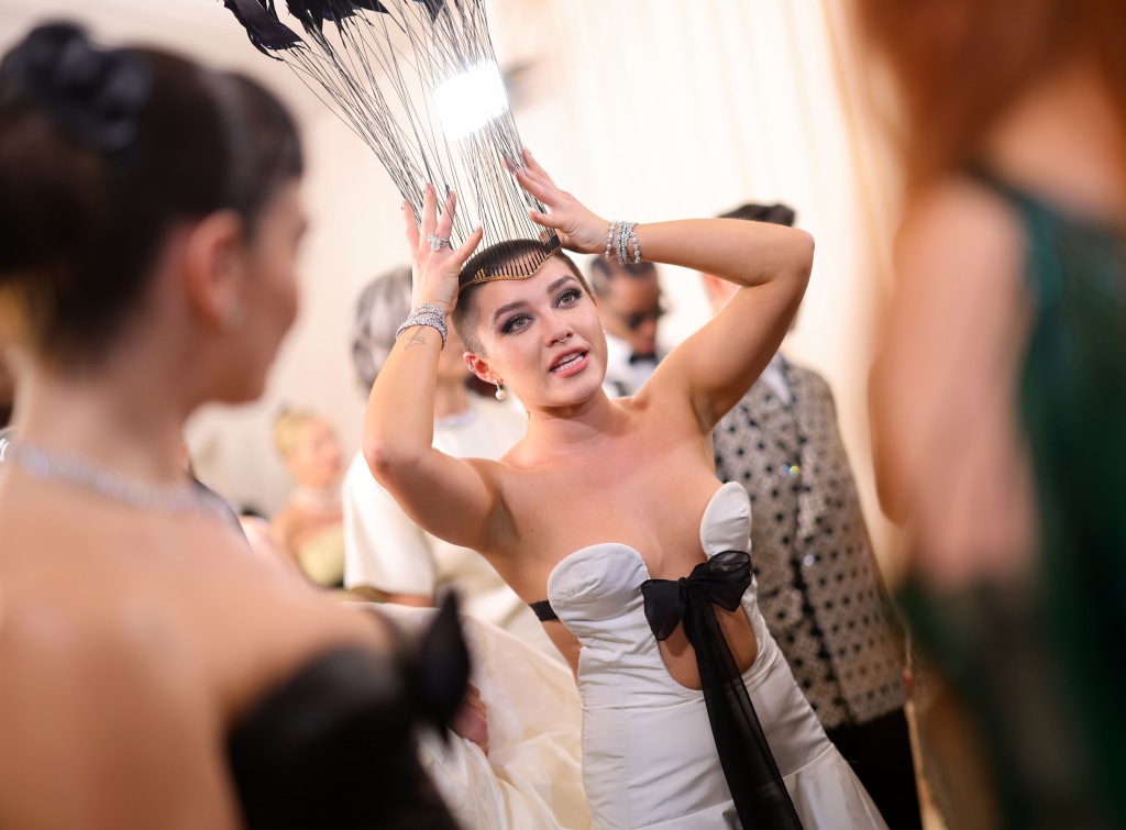 Florence Pugh at the met gala in headpiece and white gown