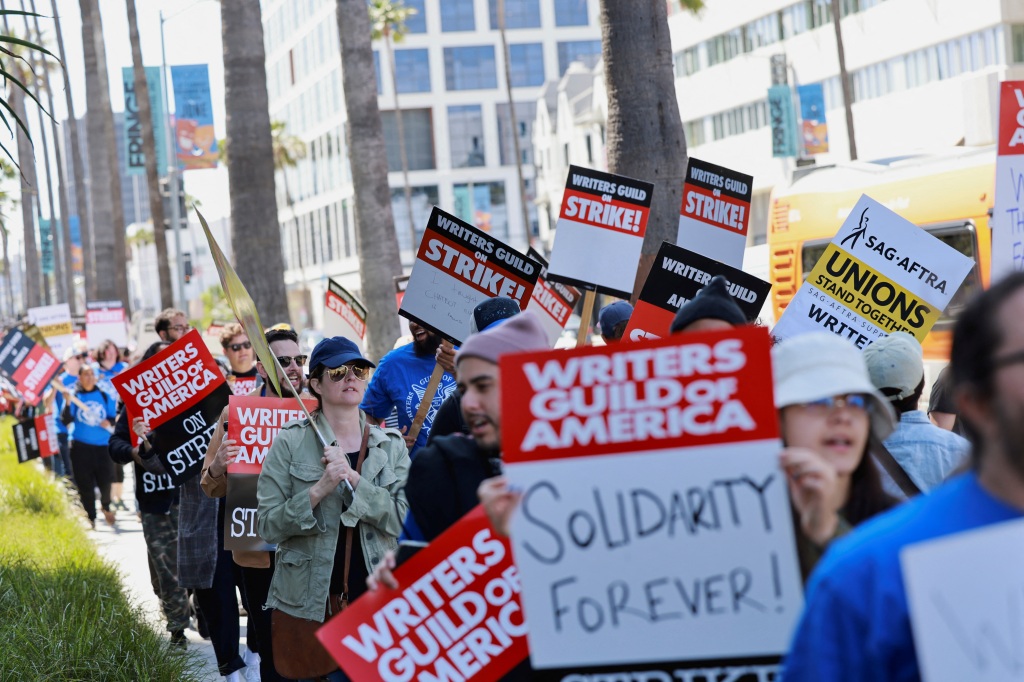 Workers and supporters of the Writers Guild of America protest outside the Netflix offices after union negotiators called a strike for film and television writers in Los Angeles.