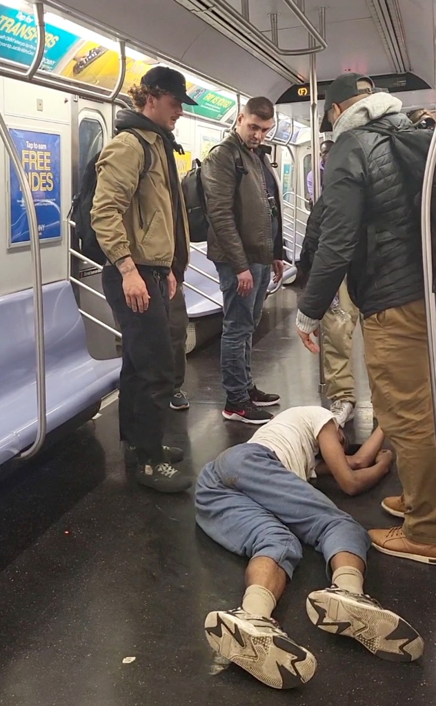 Images showing Jordan Neely on the floor of a subway after chokehold by Marine, standing left.